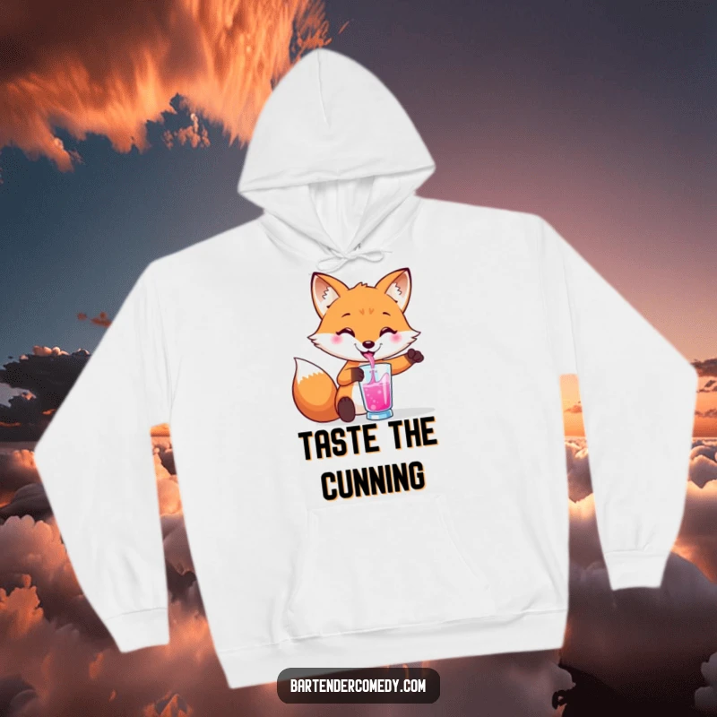 Funny hoodie with a smiling fox pouring a colorful drink into a glass, perfect for cozy evenings.